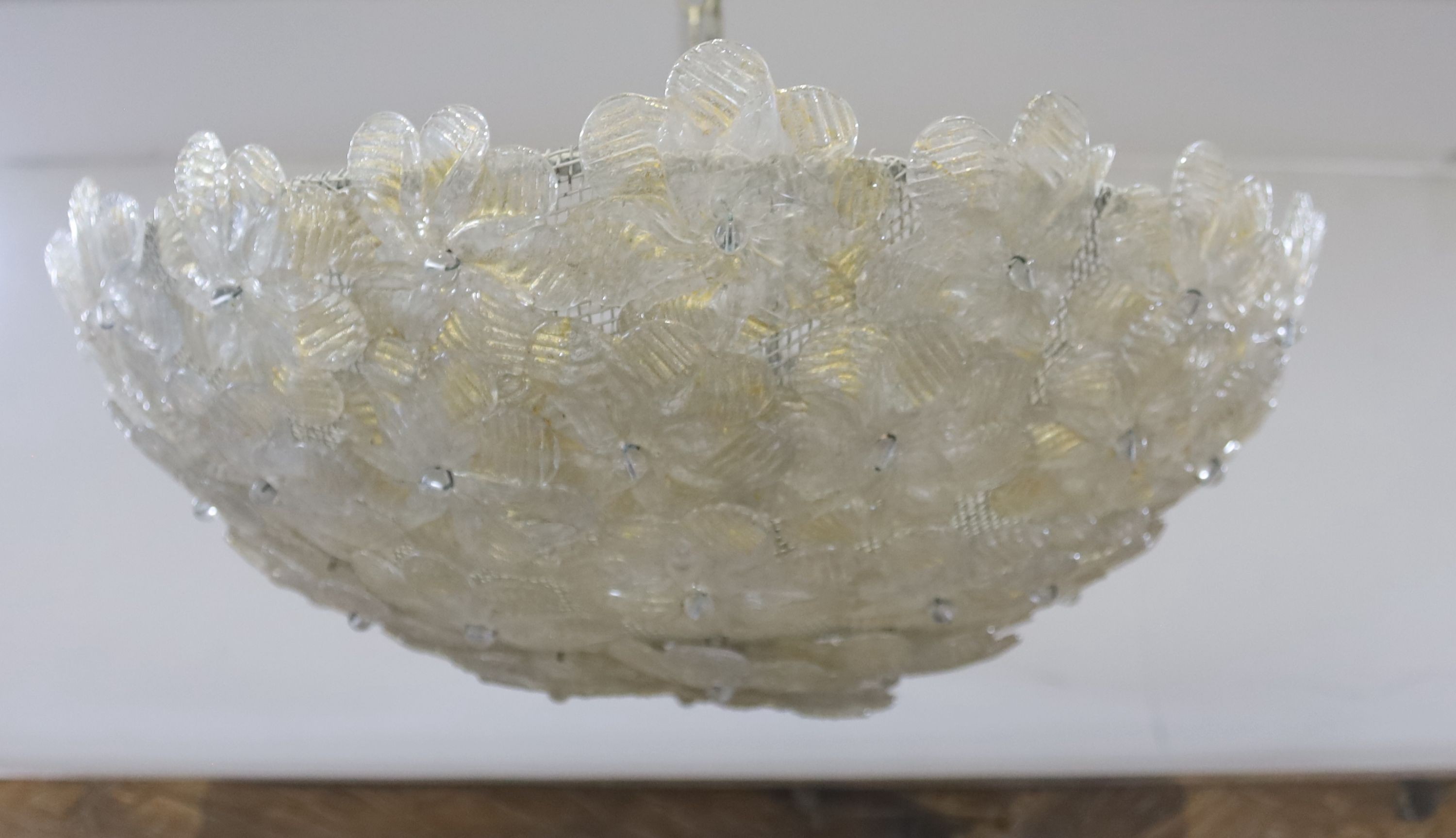 A 1960's Venetian gilt glass flower petal plaffonier, possibly Murano, 40 cms diameter. diameter 42cm.
